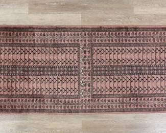 347	Turkish Style Runner Rug	"Turkish style runner rug. Repeating geometric motifs against pink field. Stains, wear and warping throughout runner. Heavy losses and deterioration to fringed edges. Creases to one fringed edge. 

2' 6 1/2"" x 10' 1"". 9 lbs."
