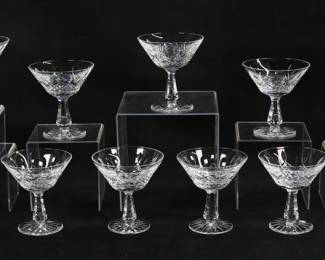150	11 Waterford Crystal Kenmare Champagnes	11 pieces signed Waterford crystal stemware. Champagnes / sherbets in the Kenmare pattern. All with etched Waterford marks. Each 4 3/4"H. 2 with rim chips, 1 with flake to base.
