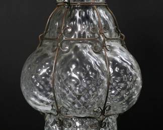 34	Murano Caged Glass Pendant Light	Murano Seguso style glass hanging pendant light with metal frame. 14"H. Rusting to metal frame.
