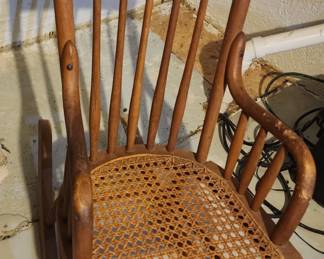 Cane seat rocking chair some damage on left foot