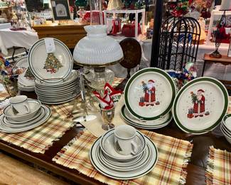 We have three different sets of Christmas dishes...these are stoneware, 56 Pieces in Christmas Tree pattern and 30 Pieces in Santa pattern, and add'l set with Christmas trees (see other photos)