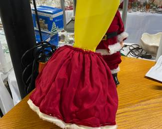 JOY detergent bottle under Mrs. Claus' Dress 