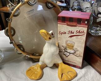Spin-the-Shot Game, Ceramic Silly Duck, and reverse side of Ludwig Tambourine 