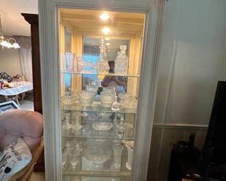 Taller white/cream color lighted curio