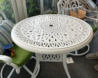 Purchased in March, beautiful patio table with 4 swivel chairs, cushions an lumbar pillows.