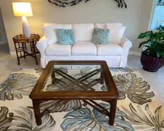 Area rug and fish wall art sold