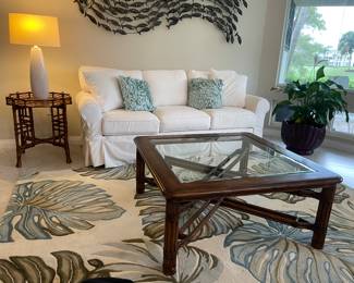 Area rug and fish wall art sold