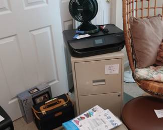 hassock, small  filing  cabinet, printer, fan ,ironing  board