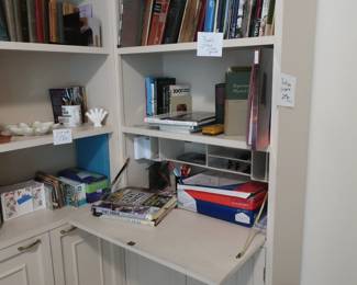 more  books-  the  white  bookcases  are  connected