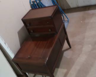 record  player  inside  of  mahogany  step  table
