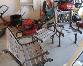 items  in  garage ,two wood  chairs   and  a  table