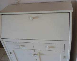 white cabinet  with  drop  front