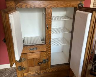 INTERIOR OF THE ANTIQUE OAK ICEBOX 