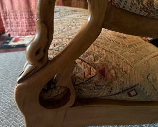 DETAIL OF ARMS ON THE LOVESEAT 