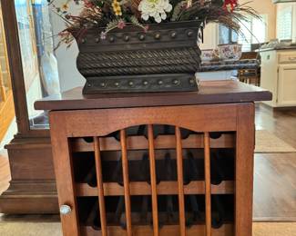 I think this piece is the reason my back hurts right now - it’s a heavy duty wine rack all right !! Ps is t the flowers on top pretty!!! 