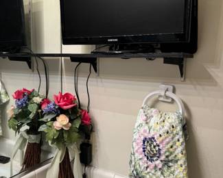 Tv - such a pretty bathroom I would love to soak in a tub and watch a little