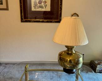 Glass and brass table with brass lamp, 