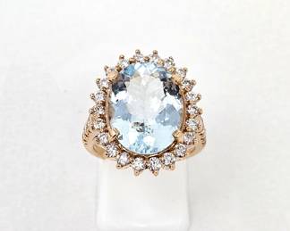 Lot #SB 307 - 7.88 Carat Natural Aquamarine Oval Brilliant Cut Slightly Blue in 18k Rose Gold Ring w/ Thirty Diamonds - Size 7 (w/ appraisal)