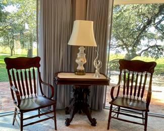 American Eastlake Parlor Table C. 1890, Victorian Captain’s Armchairs C. 1880-These chairs were from Judge Strickland’s office. It was stated by his daughter that there were originally 12, and Helyn Farris purchased 2 from city manager TJ Smith. They were in the local police station. 2 of these chairs were donated by the William Harrison family to the Prairie Edge Museum and are on display there.