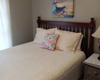 Wood headboard, footboard and bedframe from the same collection as the dresser/ chest of drawers and Mirror.