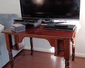 Large flat screen TV. VCR. DVD players.