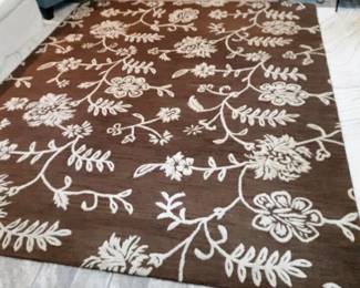 Wool rug 8'x10' hand woven design
In brown and tan