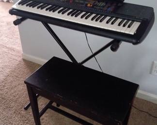 Yamaha keyboard including stand.