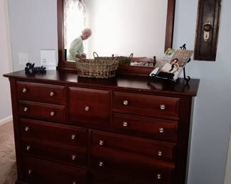 Bassett furniture, reasonably priced large solid wood dresser / chest of drawers. Includes matching mirror. Also available is the matching queen bedframe, part of the same set.