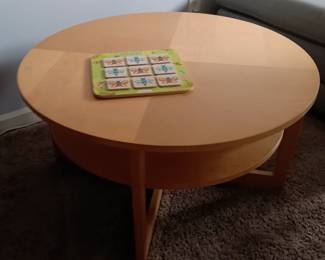 Double tier, sturdy coffee table, looks new .