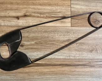 Large metal safety pin wall art
