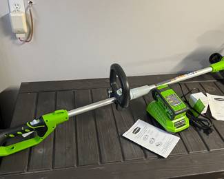 Green Works trimmer with battery charger