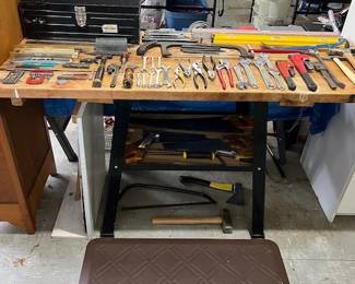 work bench, vintage tool box, various tools