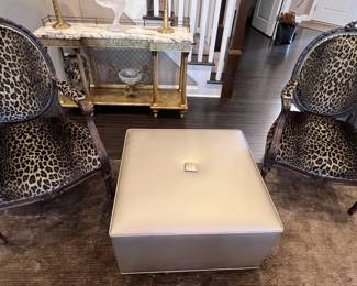 25. Pair of Carved Fauteuil Chairs w/ Leopard Print Upholstery (27" x 24" x 40")
26. Ottoman w/ Metallic Upholstery (30" x 30" x 16")