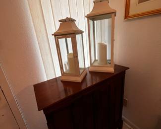 Two door cabinet, lanterns
