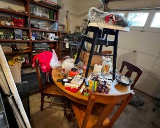 Antique oak table with 4 chairs, high chair, ironing board