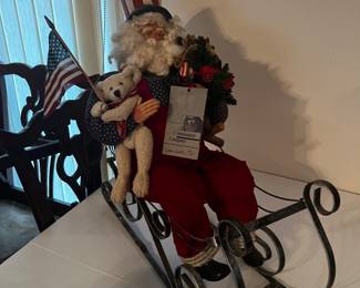 Patriotic Santa in sleigh