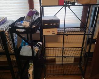 Black plastic rolling storage