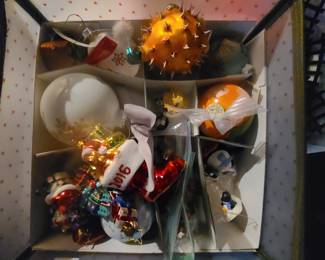 Several Disney ornaments... 2 tables full