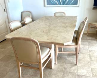 Postmodern double pedestal, faux travertine table