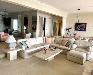 Three travertine side tables still available. The coffee table is sold. Very comfortable, custom fabric, sectional, and an armchair and ottoman