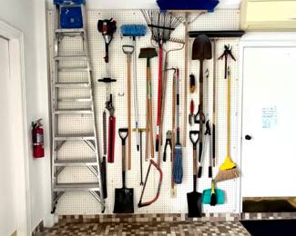 Long Handled tools and a ladder
