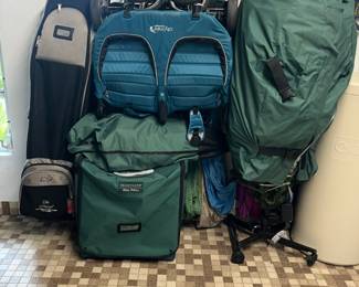 Front gate Christmas tree and Christmas ornament storage unit, strollers and club bag