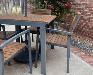 Cute outdoor table and chairs with umbrella