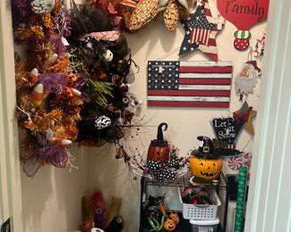 A whole closet of holidays wreaths, sprays etc