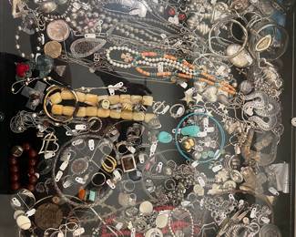 Zoom in to see, we have John Hardy, David Yurman, Chanel, Tiffany and Co, Diane Malouf, French Kande, Kendra Scott, James Avery, Prada, lots of sterling silver