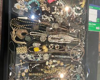 Zoom in to see, we have John Hardy, David Yurman, Chanel, Tiffany and Co, Diane Malouf, French Kande, Kendra Scott, James Avery, Prada, lots of sterling silver