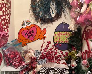 A whole closet of holidays wreaths, sprays etc