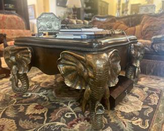 Look at this elephant head coffee table!! 
