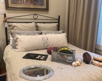 Iron queen bed, beautiful Restoration Hardware bedding, Oleg Stavrosky limited edition cowboy print. 