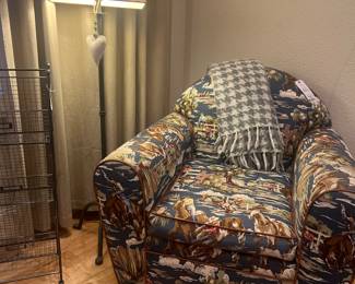 Western print oversized armchair, floor lamp, magazine rack